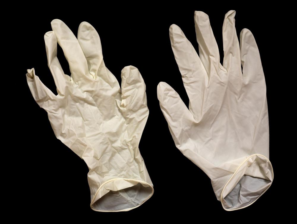Some rubber gloves have talcum powder inside to make putting them on easier.