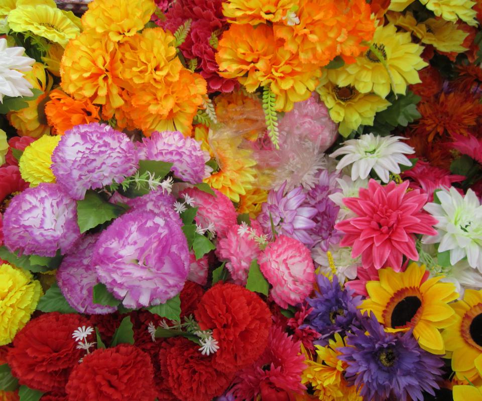 Updos may be decorated with artificial flowers.