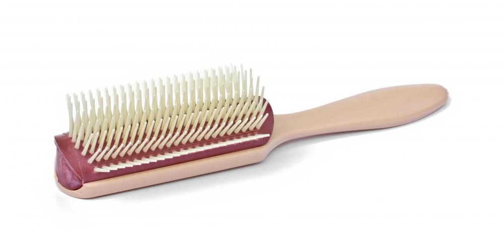 A regular hair brush can be used to brush a beard.