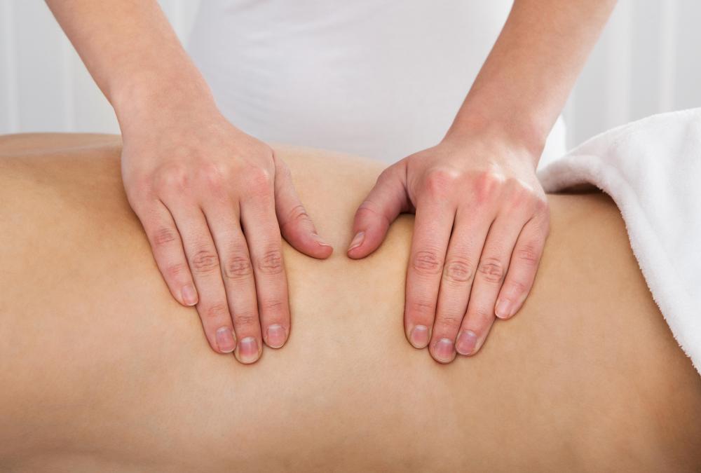 Hand pressure being applied in a Shiatsu Massage.