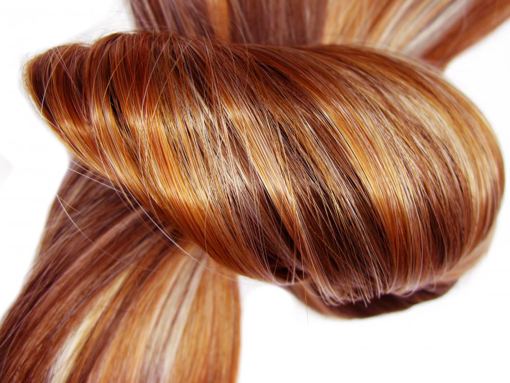 A hair masque is a deep conditioning treatment that promotes shiny, healthy hair and is often applied two to four times a month.
