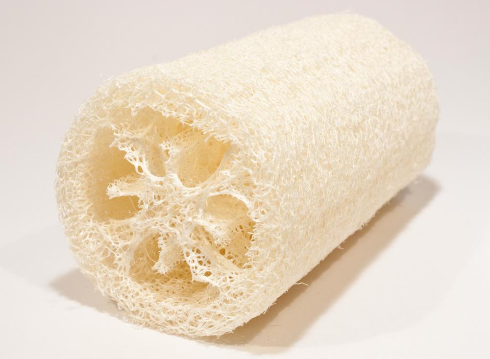 Loofah sponges are used to exfoliate legs.