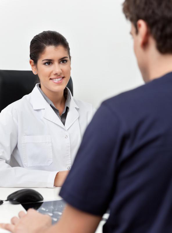 A patient will meet with a doctor for a consultation prior to cheek augmentation surgery.