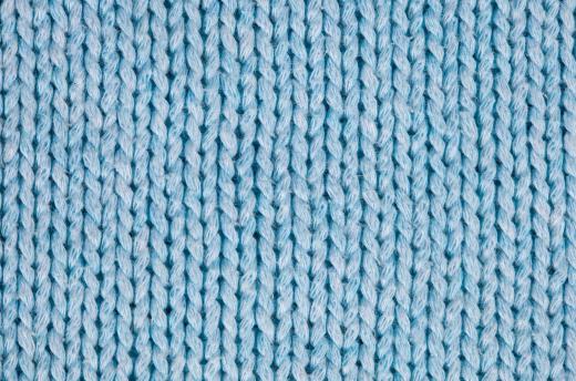 A cardigan can be made of knitted yarn.