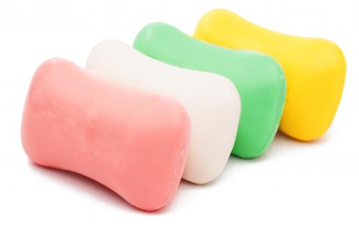 A shower caddy may hold bars of soap.