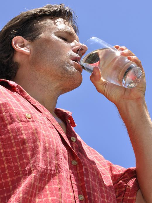 Drinking more water can help treat dehydration that may be contributing to puffy eyes.