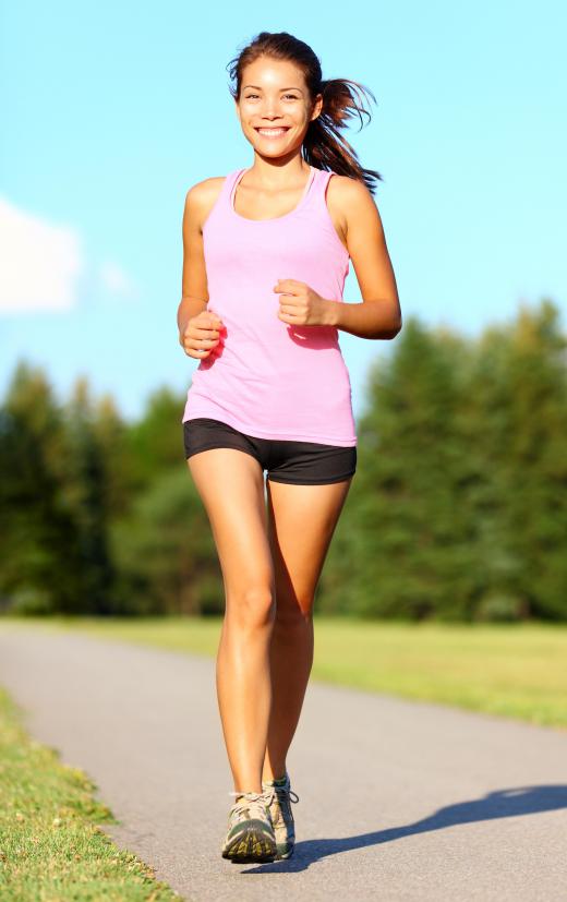 Exercise that causes perspiration, such as jogging, will aid in the removal of a a henna tattoo.
