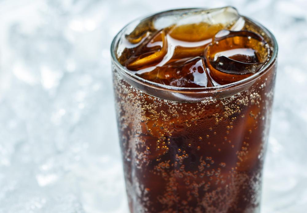 Acidic drinks like soda can wear away tooth enamel.