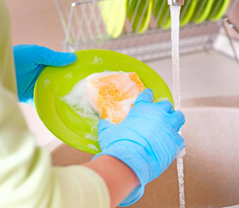 Wearing gloves while washing dishes may help improve nail growth.
