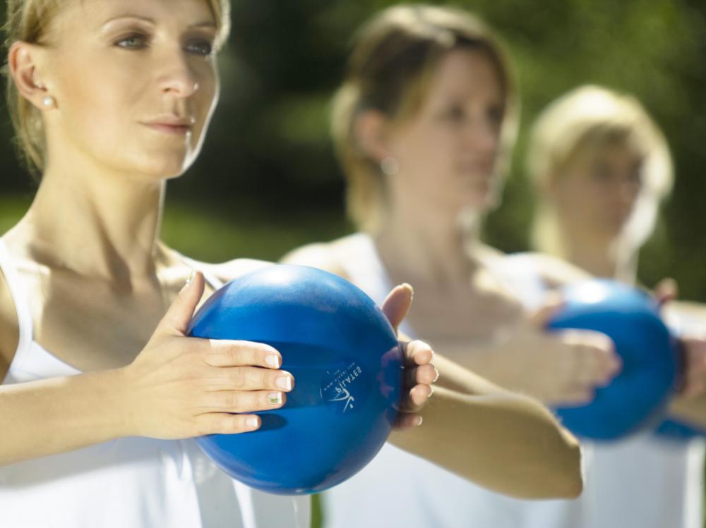 For those who are capable, doing pilates or yoga with light weights may be more effective than using a body wrap for a more toned stomach.
