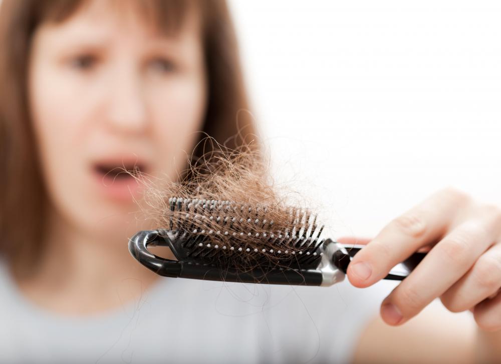 Bald patches can occur in older women.