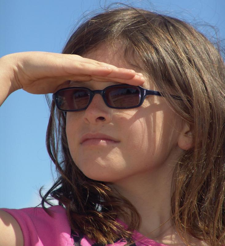 People should typically wear sunglasses when they are outdoors.