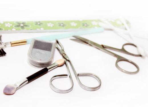 Scissor tweezers may be used to remove unwanted hair.