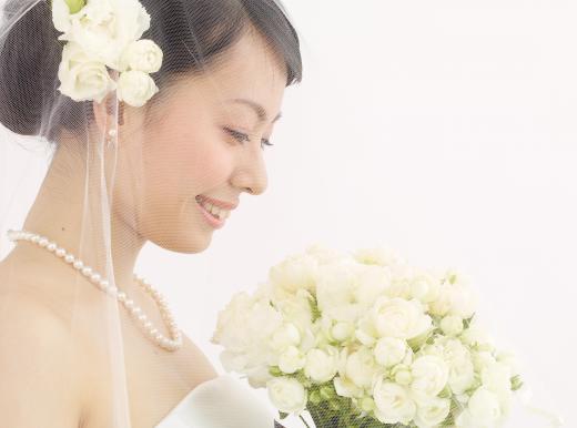 A bride traditionally tosses her garter after a wedding.