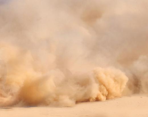 Part of a keffiyeh often hangs to the side, so that the nose and mouth can be covered in dust storms.