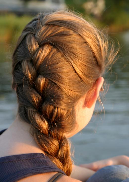 A woman with thick hair.