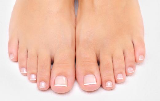 A medicure treats medical problems with the feet, as well as softening the skin and polishing the nails.