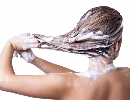 When washing hair in hard water, use a clarifying shampoo at least once a week.