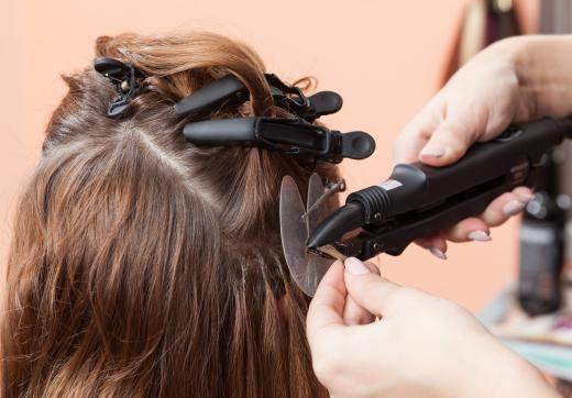 The wig glue used to bond extensions with natural hair often requires heat to set.