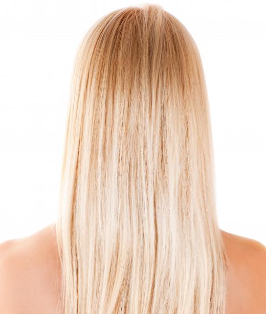 Straightening cream can be used to tame and straighten curly or frizzy hair.