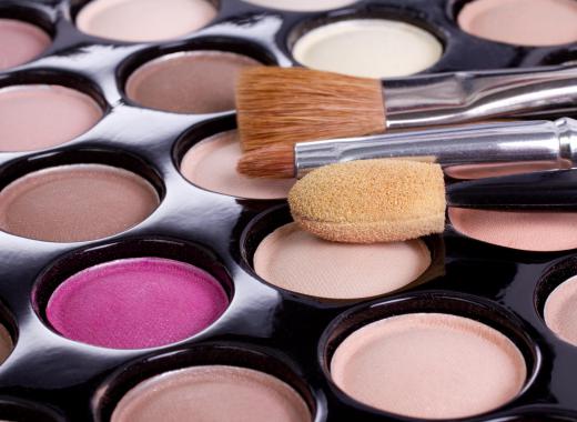 A makeup artist needs eye shadows and brushes.