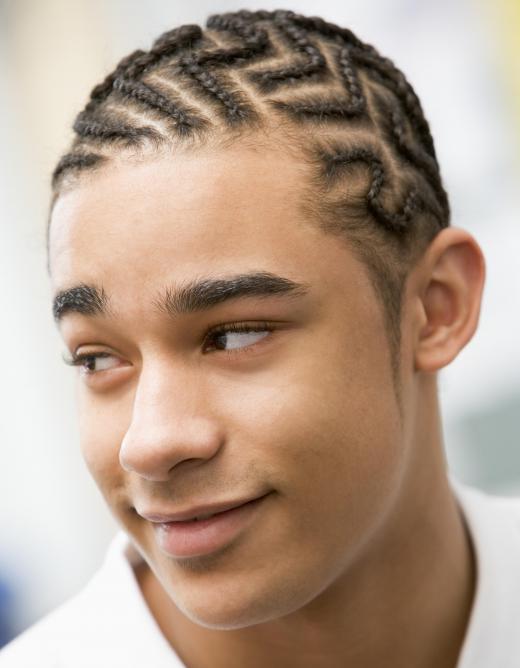 Braided cornrows are one type of black hairstyle.