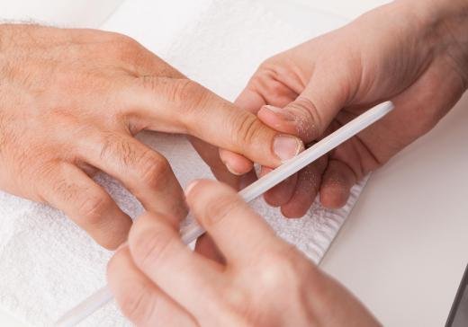 Filing the nails is a good idea prior to applying henna.