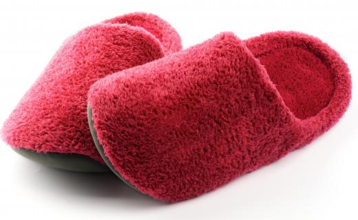 Fuzzy slippers are designed to keep feet warm.