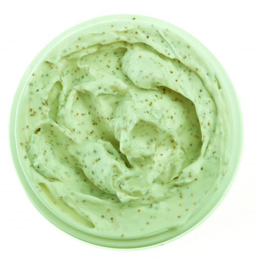 A facial scrub with exfoliating beads can be effective for reducing oil and eliminating blackheads.