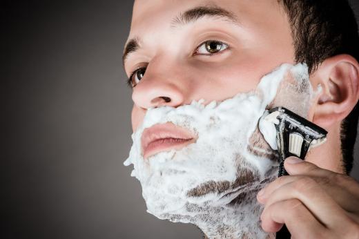 Men often use shaving cream when shaving their face.