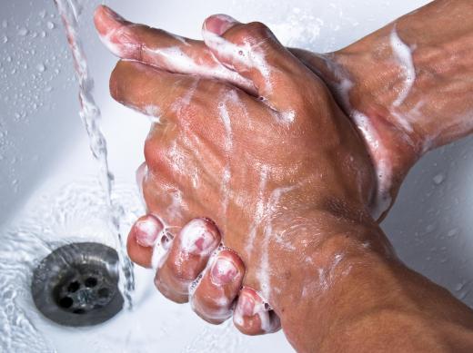 Someone who regularly washes his hands might experience peeling fingernails.