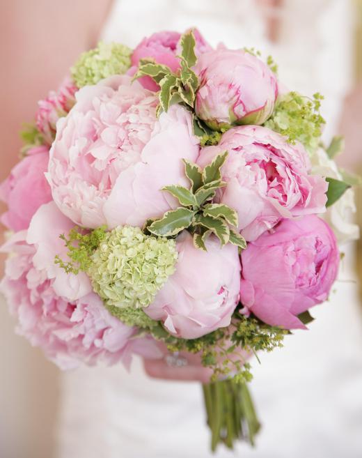 At a wedding, the corsages often match the bride's bouquet.